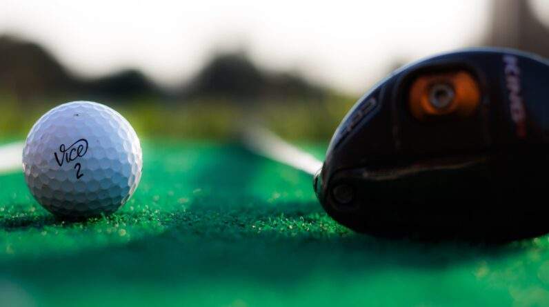 shallow focus photography of white golf ball