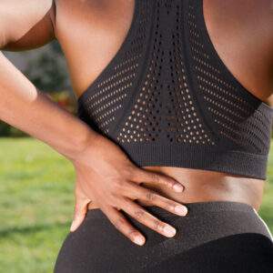 A woman having a back pain